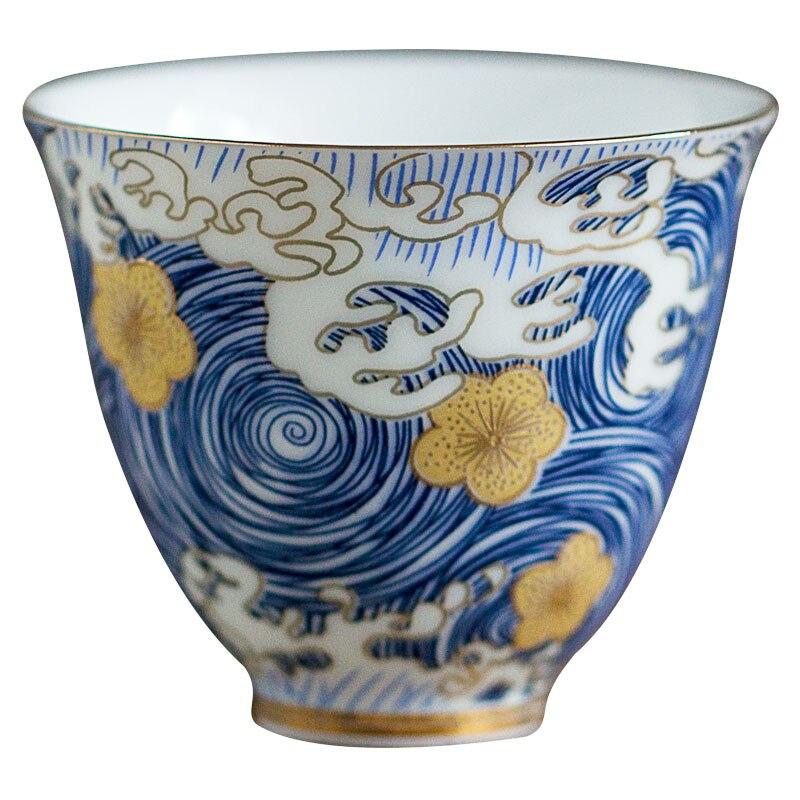 Tasse à thé en céramique émaillée, tasse et soucoupe artisanales, style vintage, idéales pour la décoration intérieure. Service à thé avec accessoires de haute qualité.